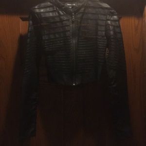 Crop faux leather and sheer accent jacket.